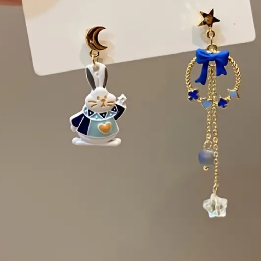 Alice And Wonderland Asymmetrical rabbit earrings.